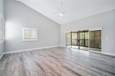 living room area, plantation shutters, sliders to