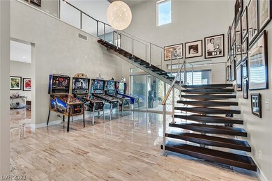 This elegant floating staircase traverses the area