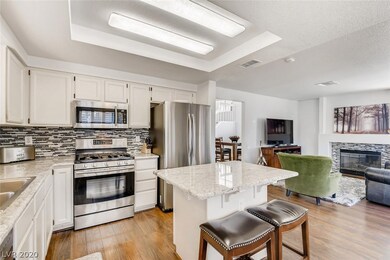 Great kitchen and living room with fireplace