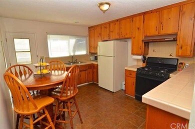 Super clean with beautiful Knotty Pine cabinets.