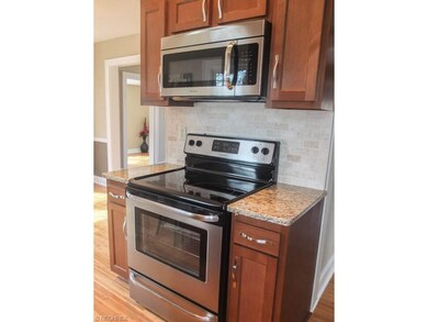 Kitchen has stainless steel appliances.