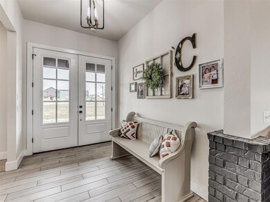 Greet guests in the wide & welcoming entry hall.