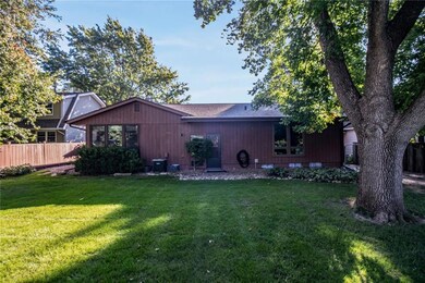 Mature landscaping and fenced yard.