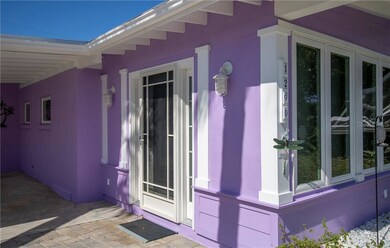 Convenient front entryway off carport.