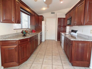 Stunning Kitchen With Cherrywood Cabinet