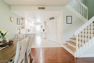 Dining room featuring light tile patterned floorin