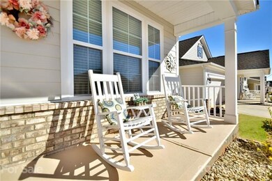 Beautiful front porch to sit, rock and relax on.