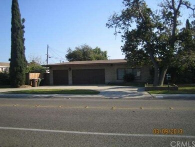 3 Car Garage with 1 more in back yard
