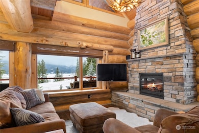 Cozy up by the stone fireplace and enjoy the views.