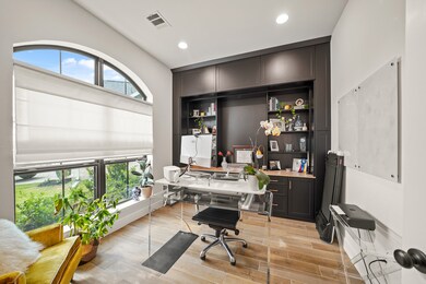 Home Office features lovely custom built-ins, & ex