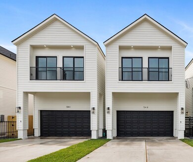 Welcome Home 724 E 38th featuring a private + driveway euipped with nest camera.