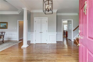 The pretty pink door, freshly painted formal rooms