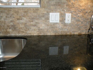 Granite Counters & Stone Backsplash