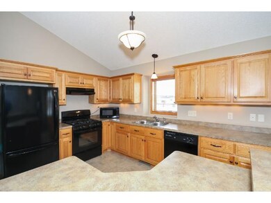 Kitchen is efficient with plentiful counter space 