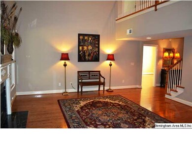 Beautiful great room with vaulted two-story ceilin