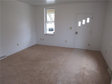 White walls, NEW carpet and 2 newer windows in the