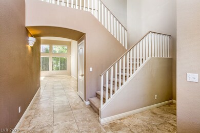 Open foyer with high ceiling.