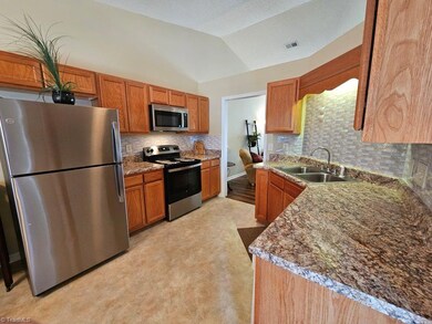 Recent upgrades include refrigerator, stove, built-in microwave, designer countertops