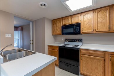 Another view of the kitchen open to the dining are