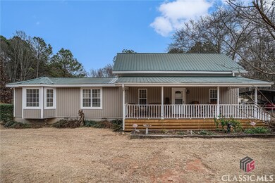 1061 Treadwell Bridge Rd, Statham, GA 30666 - photo 2