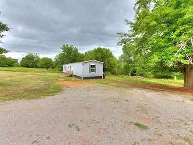 View of yard with an outdoor structure