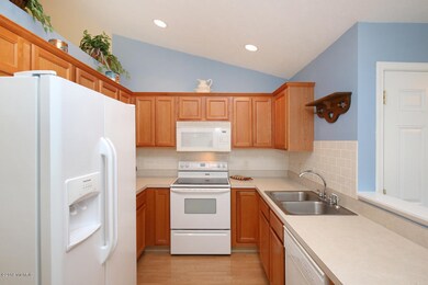 1369 Echoing Valley Dr SW unit 34, Byron Center, MI 49315 - photo 4