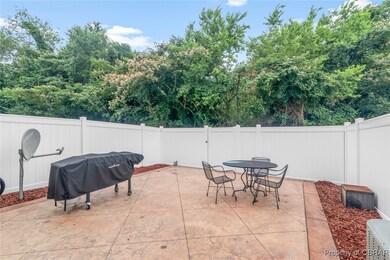 Fenced backyard featuring a patio, area for grilli
