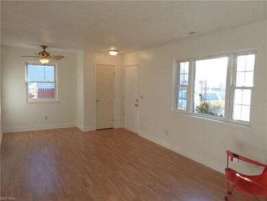 View #1 of the living room w/brand new wood and vi
