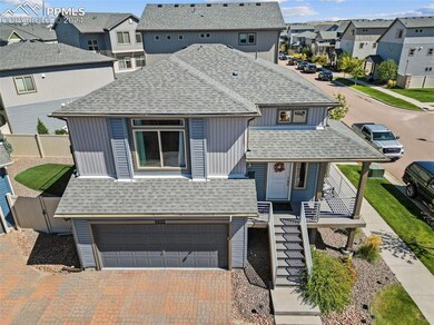 View of property with a garage