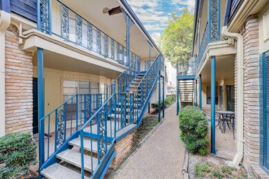 Beautifully manicured courtyard leading up to the