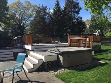 Patio off the Great Room with steps to pool and ho
