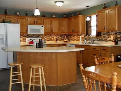 Kitchen. beautiful backsplach and center island