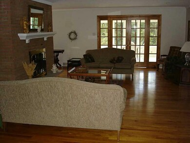 Living Room. Hardwood, Wood fireplace