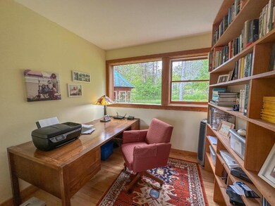 Perfectly-Sized Office With Wall of Shelves