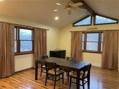 Large vaulted ceiling great room off kitchen.