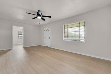 Remolded house in Sayre, OK with light wood like flooring