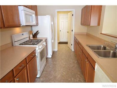 Kitchen. Kitchen leads to the separate laundry are