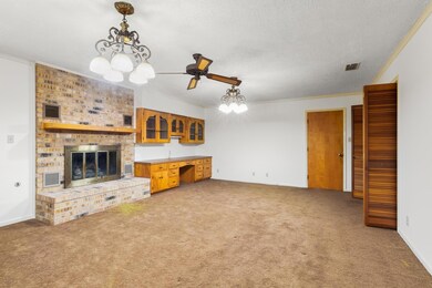 Unfurnished living room with a chandelier, light 