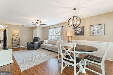 Spacious, natural light-filled living room.
