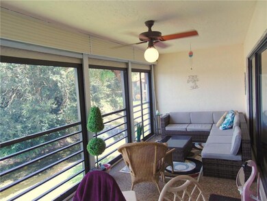 BIG PATIO WITH PLEXIGLAS TYPE SIDING WINDOWS AND R