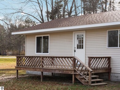 7808 Bacchanalia Ct, Cadillac, MI 49601 - photo 2