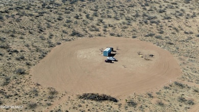 Aerial of building & cleared area