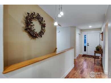 Front entry way, home has engineered hardwood floor throughout the main level.