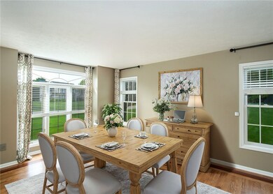 Virtually staged front room off the foyer with Fre