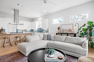 Living room with ceiling fan, recessed lighting, 