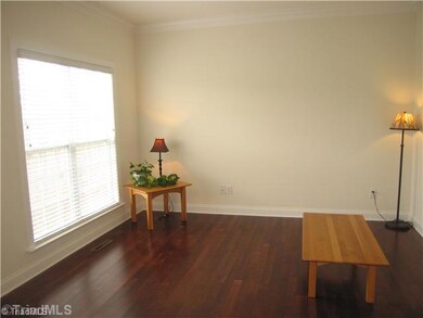 Living Room. The formal living room gives extra space for seating for guests.