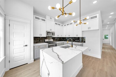 Marble countertops, complemented by stylish black