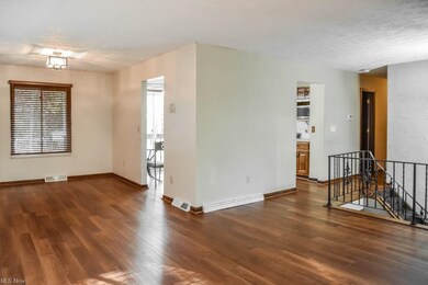 Open living and dining room with newer flooring!