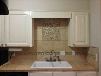 Kitchen with beautiful Tile Work