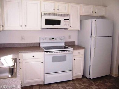 Kitchen. Kitchen has space for a breakfast table. Refrigerator is being offered with home!